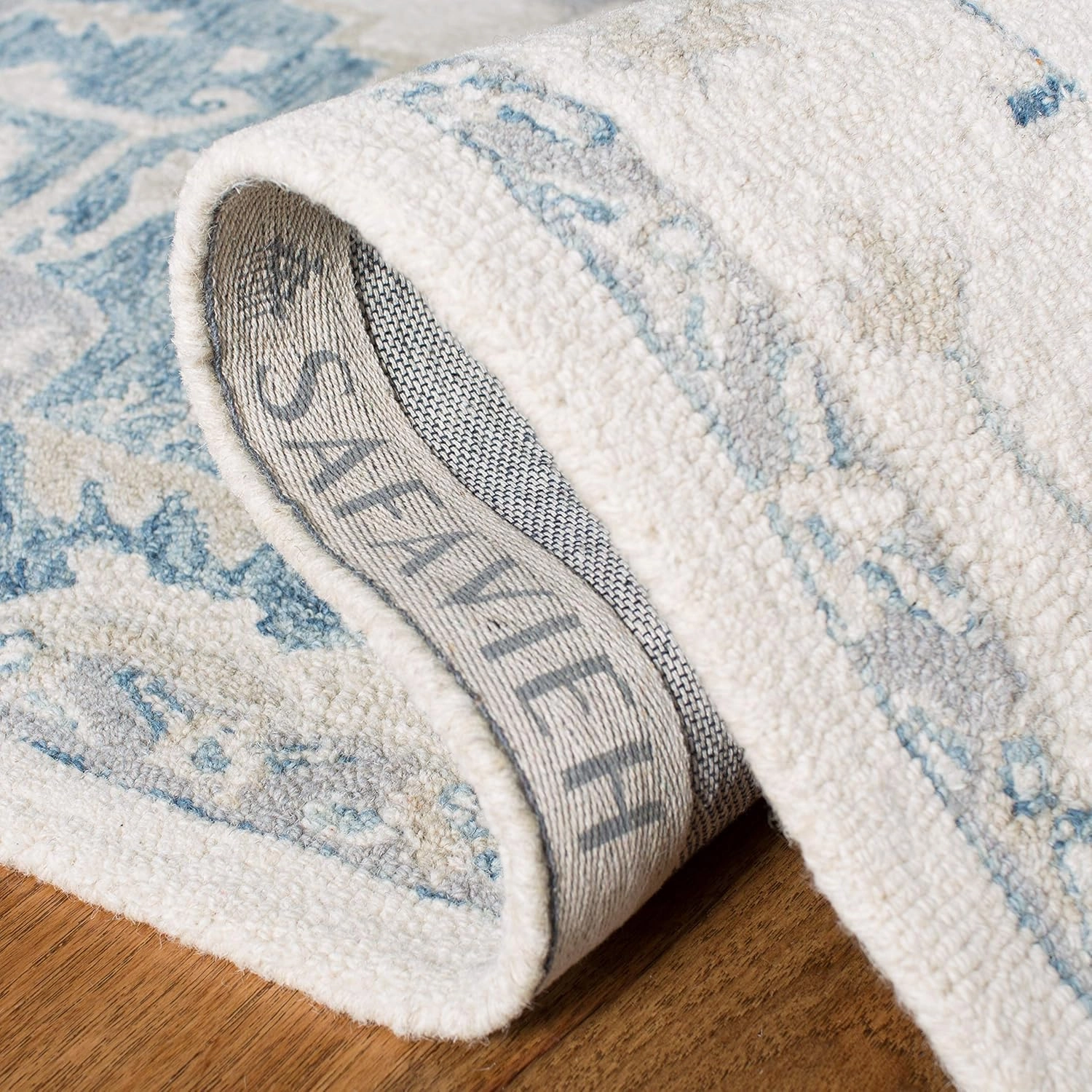 Safavieh Micro-Loop Collection Area Rug - 8' x 10', Ivory & Navy, Handmade Shabby Chic Medallion Wool, Ideal for High Traffic Areas in Living Room, Bedroom (MLP503L)