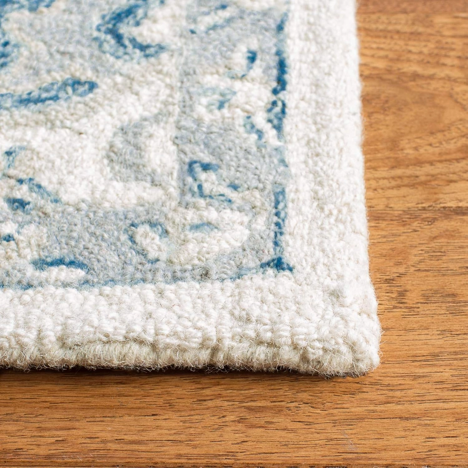Safavieh Micro-Loop Collection Area Rug - 8' x 10', Ivory & Navy, Handmade Shabby Chic Medallion Wool, Ideal for High Traffic Areas in Living Room, Bedroom (MLP503L)